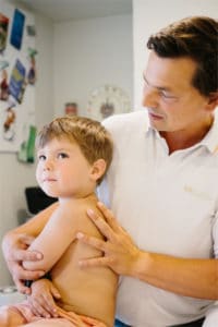 Alex Earle Osteopath Treating Children