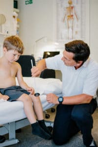 Alex Earle Osteopath Treating Children